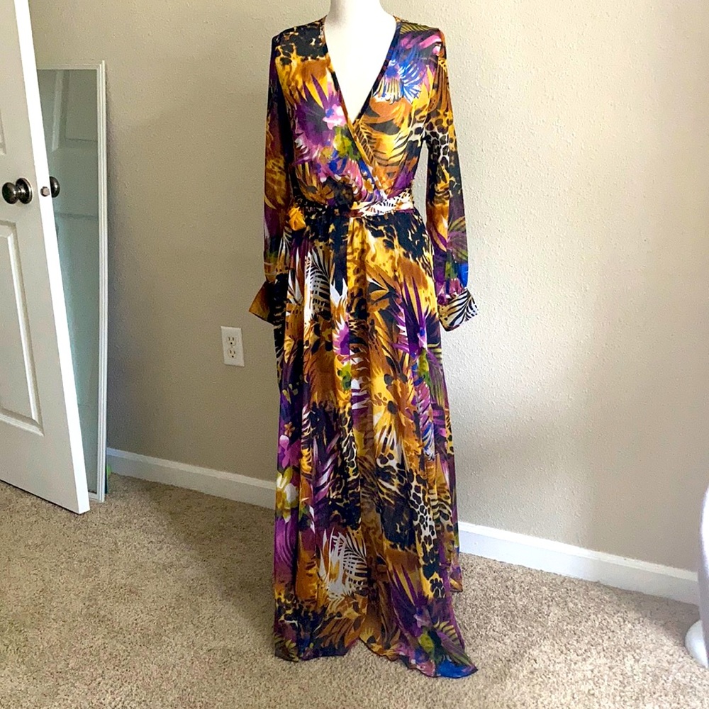 Maxi wrap top dress with button cuffs and long flowy skirt.
